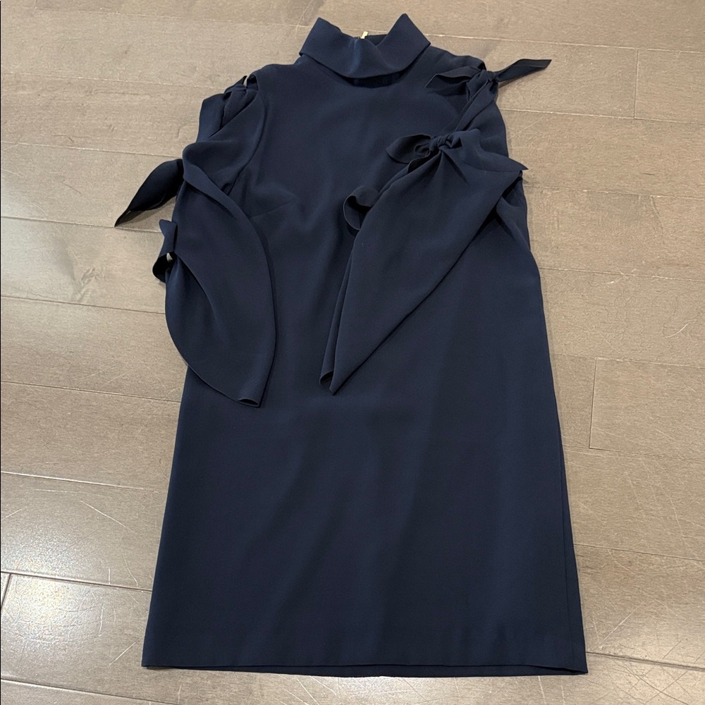 Alex Marie lined Navy peekaboo’s bow Long Sleeve Dress
